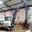 Transporte, colocação em obra e remoção de equipamento completo de maquinaria para execução de paredes moldadas 